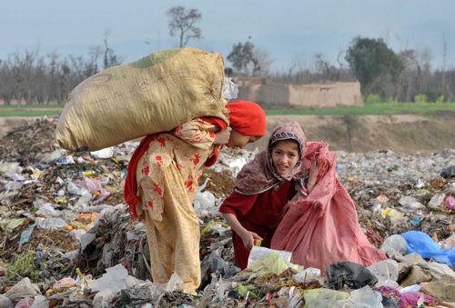 UNICEF's funding shortfall could leave millions of children like these looking for a living in garbage. -  Ashfaq Yusufzai/IPS