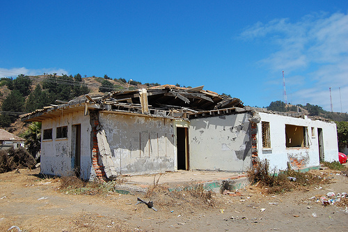 Two years later, this house in the coastal town of Iloca still bears witness to the devastating force of the tsunami.  - Marianela Jarroud/IPS