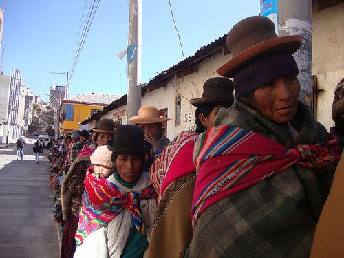 Indigenous women queuing up in a village in Peru's Puno region; they and others require budgets and aid with a gender focus. - Milagros Salazar/IPS