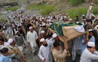 Mourners attend the funeral procession of a suicide bomber in Pakistan. But such killers are denied last rites. - Ashfaq Yusufzai/IPS.