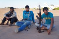 Young militia members in Kufra. - Rebecca Murray/IPS.