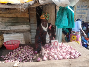 Everlyne Wanjiku, a single mother of five, has earned a living selling vegetables in the sprawling Kibera slum in Nairobi, Kenya, for 30 years. - Brian Ngugi/IPS 
