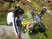 Jacqueline Condori visits the grave of her mother Bernardina Yucra. 
 / Credit:Milagros Salazar/IPS