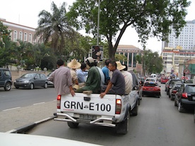 Chinese Labourers on their way to work in central Luanda. - Louise Redvers/IPS