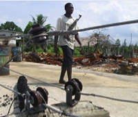 An armed Ijaw militant in Tombia, near Port Harcourt the Niger Delta's principal city. / Credit: George Osodi/IRIN