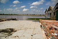 Tile floors are all that remain of homes that once stood on the eastern shore of Boeung Kak lake. / Credit:Irwin Loy/IPS