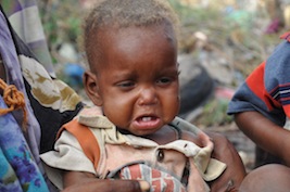 A child from drought-stricken southern Somalia who survived the long journey to an aid camp in the Somali capital Mogadishu. - Abdurrahman Warsameh/IPS