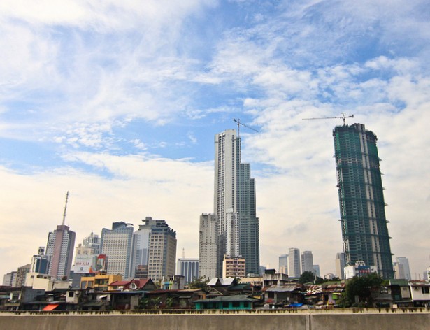The sharp contrast between the poorer communities’ shanties and the skyline of the Makati City financial district underscores the huge income gap between the haves and have-nots. The Philippines’ income disparity is one of the biggest in South-east Asia. Credit: IPS