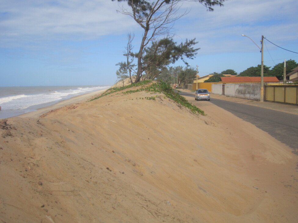 Dunes are growing and threatening the streets and coastal housing in a part of Atafona beach, after the sea and sand destroyed more than 500 houses on the beach closest to the mouth of the Paraiba do Sul river. CREDIT: Mario Osava / IPS