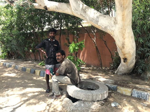 Adil Masih and Amjad Masih work in the sewers of Karachi, a dangerous and low paid occupation. Credit: Zofeen T. Ebrahim/IPS