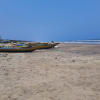The distinctive boats used by fishworkers in Andhra Pradesh, India. Their unique design, with a curvy end and flat middle, enables stability in the waters of Andhra Pradesh, reflecting the ingenuity of local fishermen. Credit: Aishwarya Bajpai/IPS