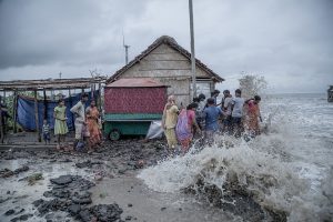 Tidal waves on Namkhana Island have flooded a house in West Bengal, India. Tidal waves on Namkhana Island have flooded a house in West Bengal, India. Natural disasters. Storms, heavy rainfall, and floods wreck havoc here. Credit: Supratim Bhattacharjee / Climate Visuals