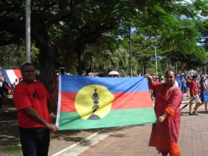 Kanak Pro-Independence supporters display the Kanak flag during a rally in the streets of Noumea prior to New Caledonia's first referendum on Independence in 2018. Credit: Catherine Wilson/IPS